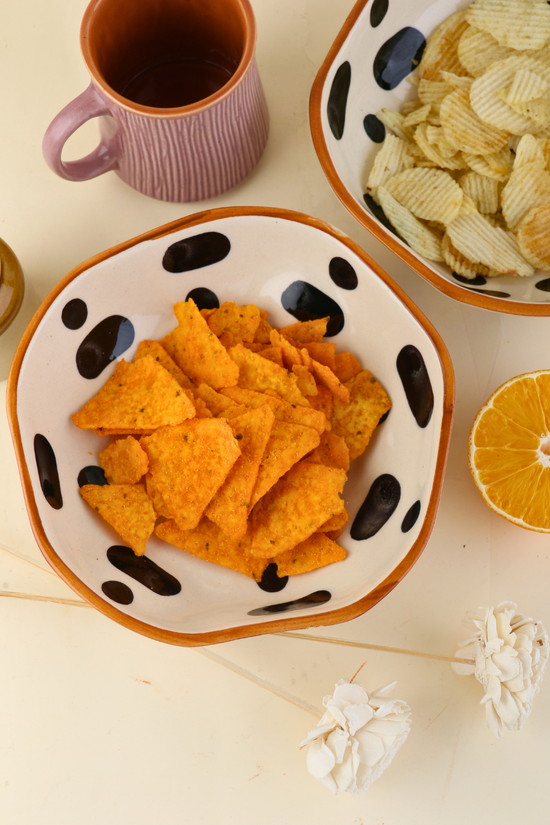 Handmade bowl with chips and snacks