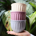 handmade planters with different colors