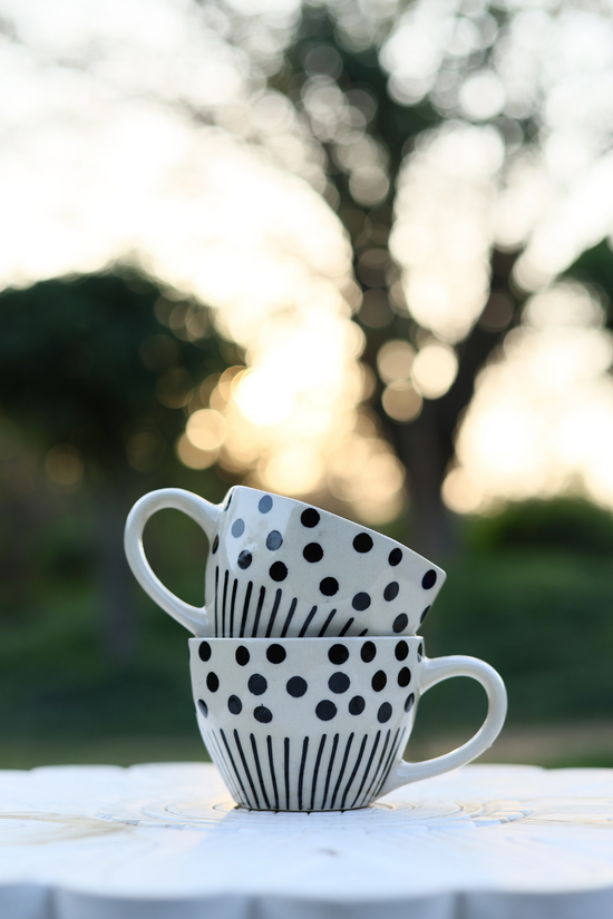 Two coffee mugs on each other