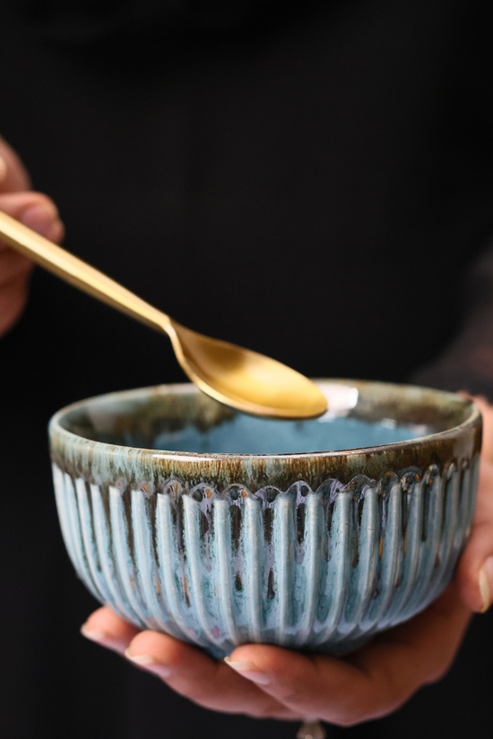 A Bowl & Spoon In Hand 