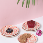 Chequered heart plates with snacks