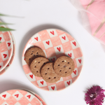 Chequered heart plates with cookies