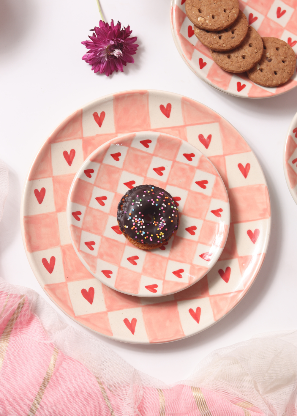 Chequered heart dinner plates with donut 