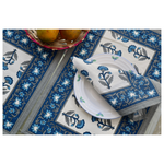 Blue motif table mat & napkin on table