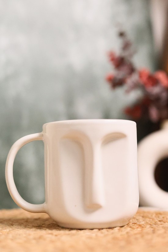 Ceramic white face coffee mug 