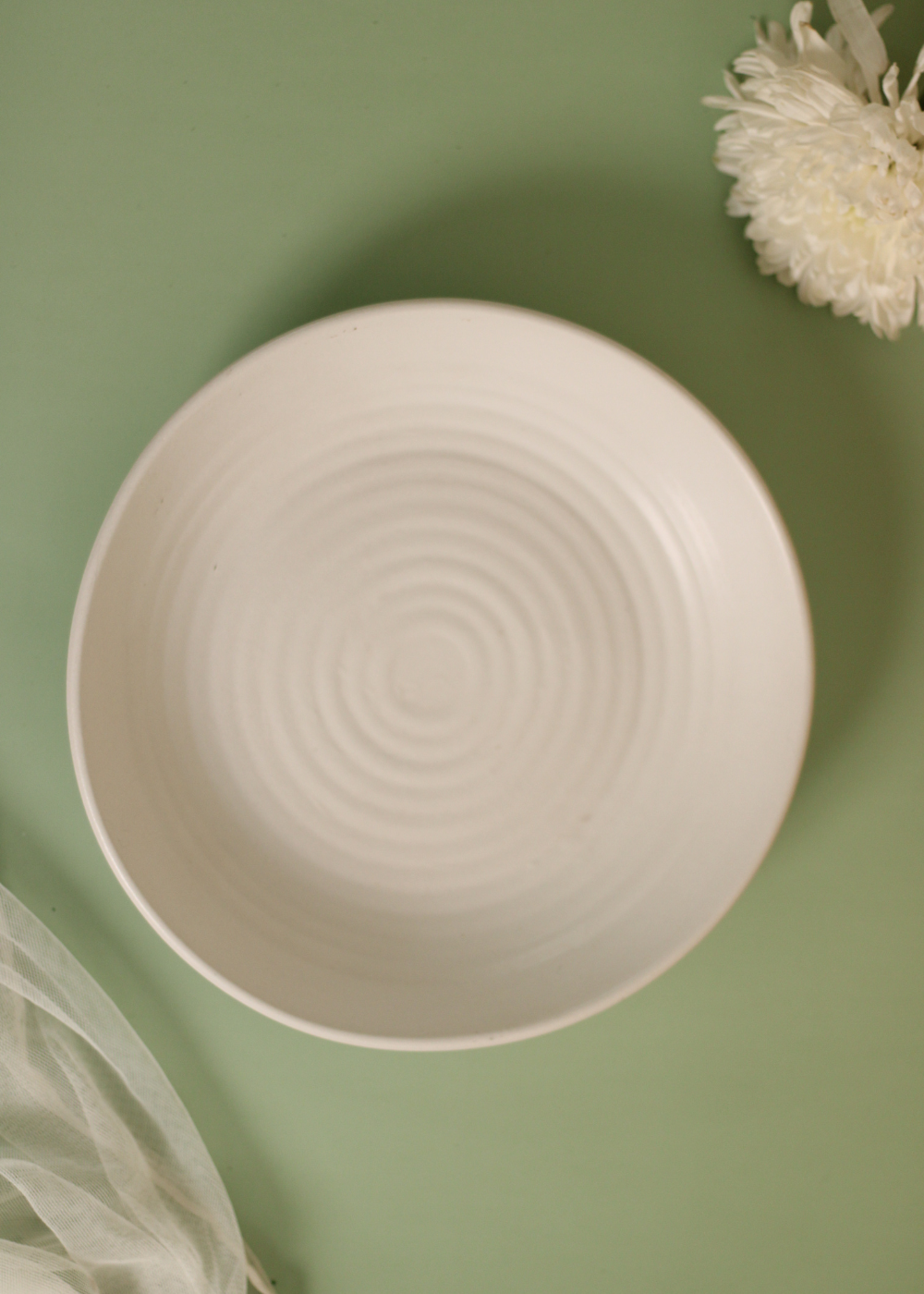 Handmade ceramic white spiral pasta plate