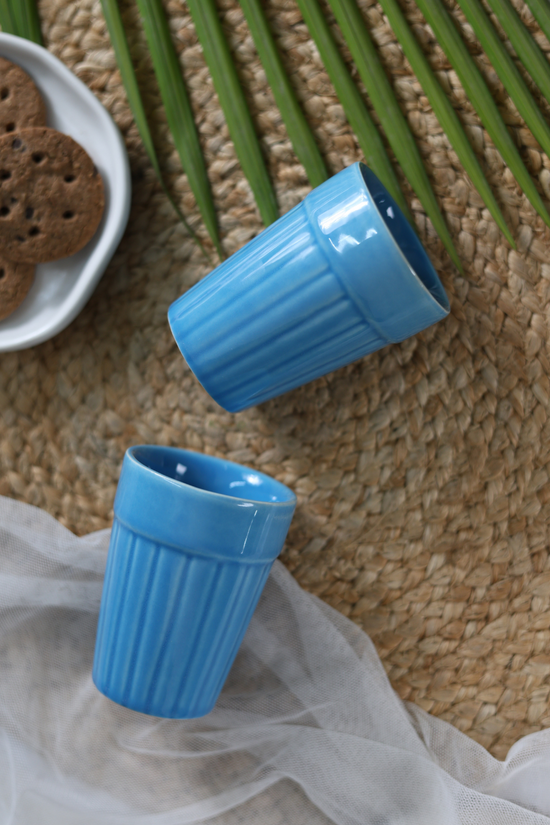 Blue kulhads with biscuits