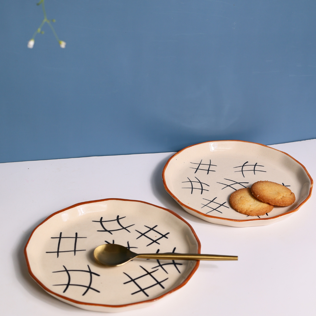 Handmade ceramic serveware plates with cookies 