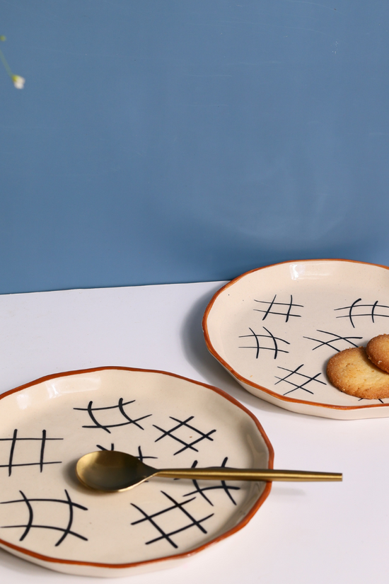 Handmade ceramic serveware plates with cookies 