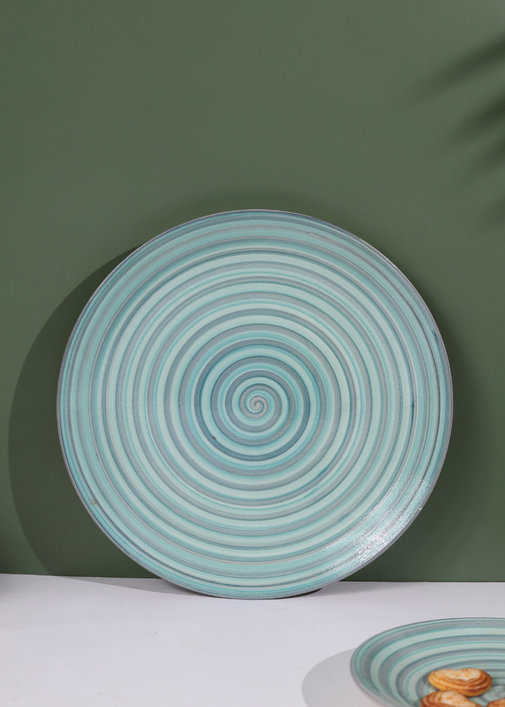 Handmade ceramic green spiral dinner plate 