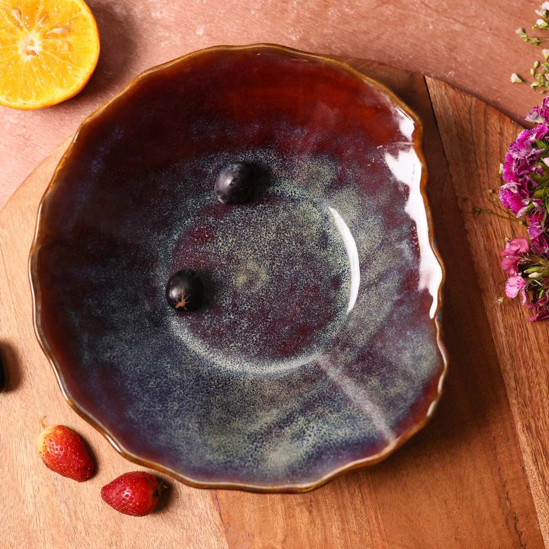 Olive mistif bowl on wooden surface 
