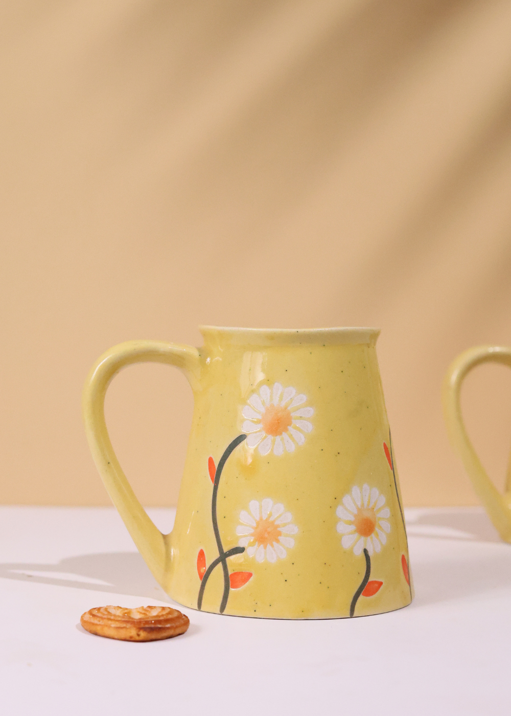 Closeup shot of yellow spring coffee mug