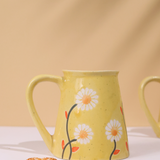 Closeup shot of yellow spring coffee mug