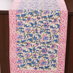 Blue & pink floral table runner on a wooden table