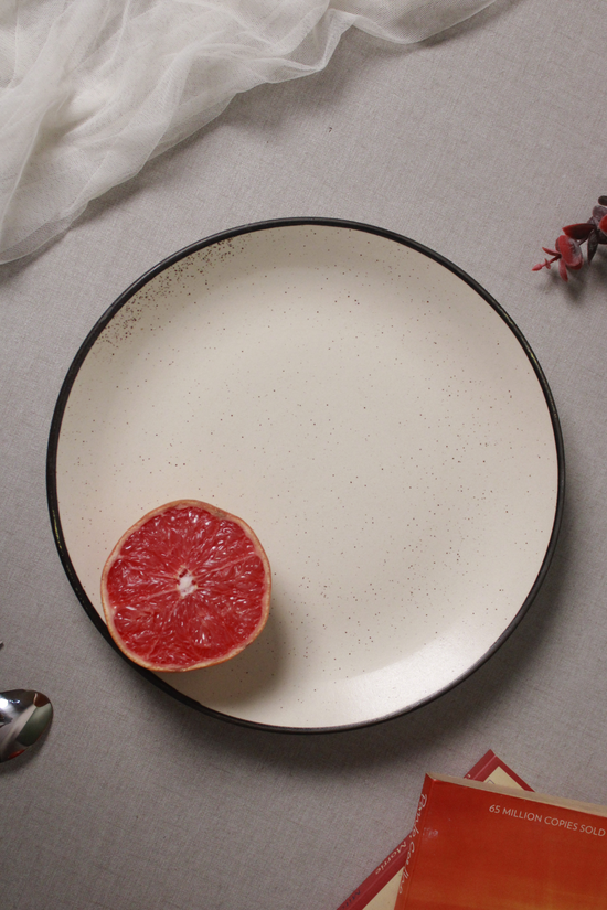 Basic white dinner plates having orange  