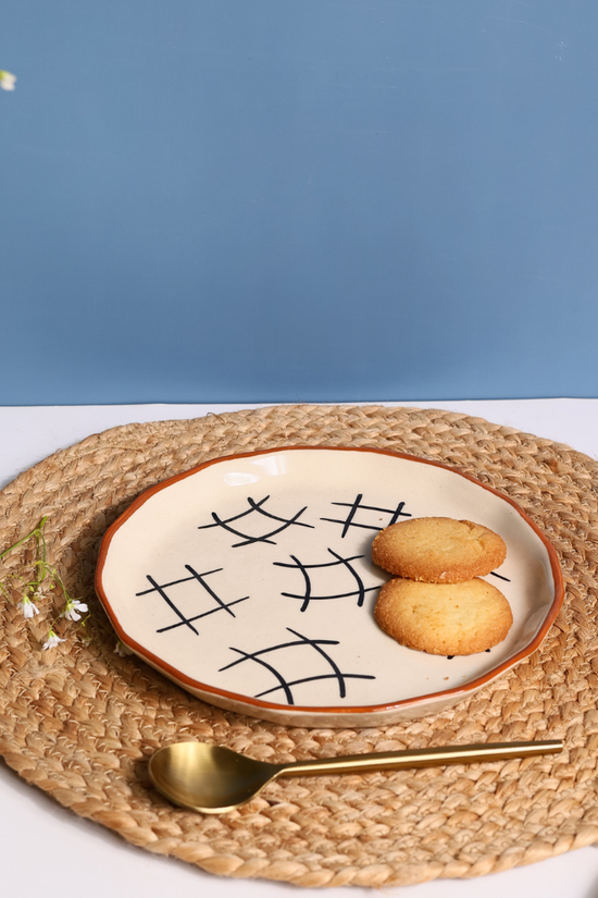 Handmade ceramic snack plate with cookies