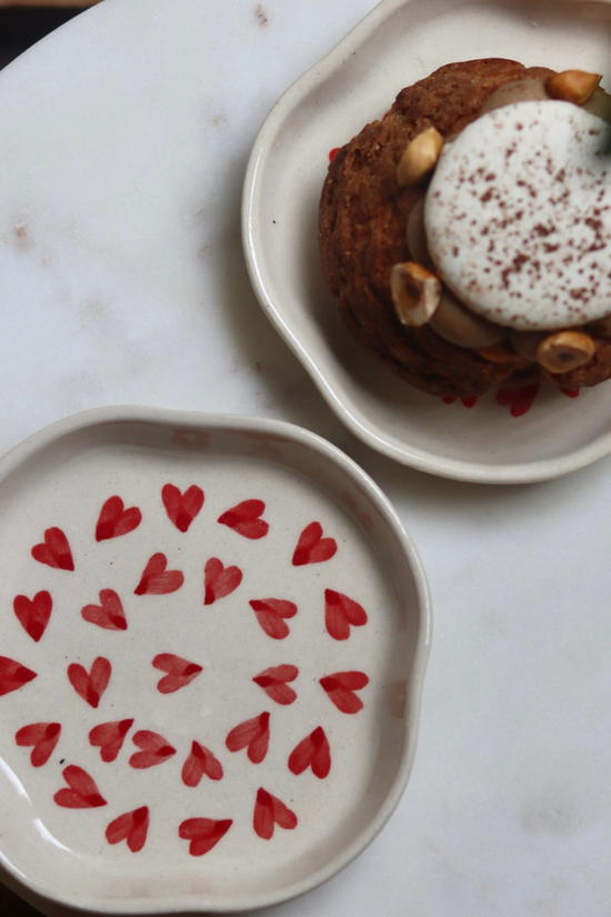 Handmade dessert plate with haeart design one having dessert