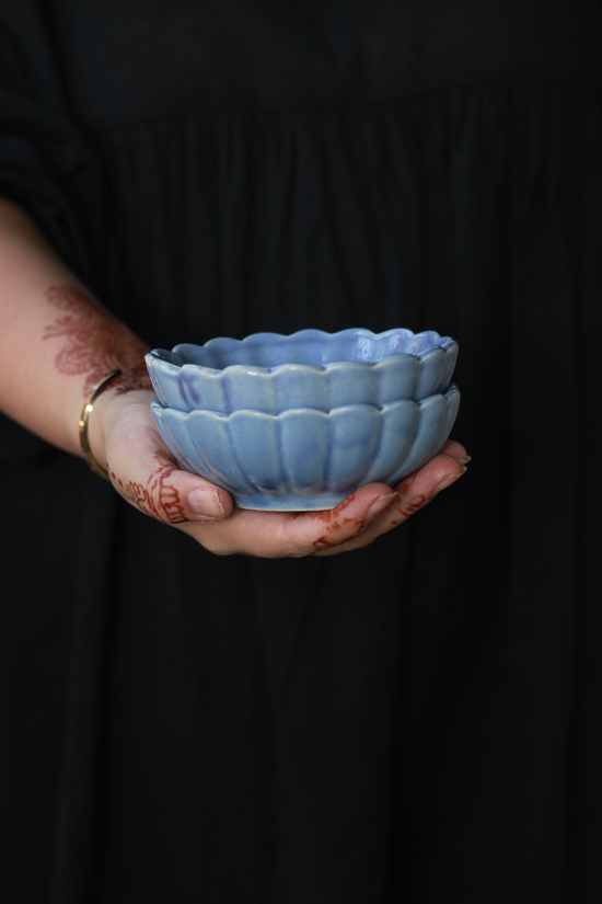 Blue flower ice cream bowl in hand