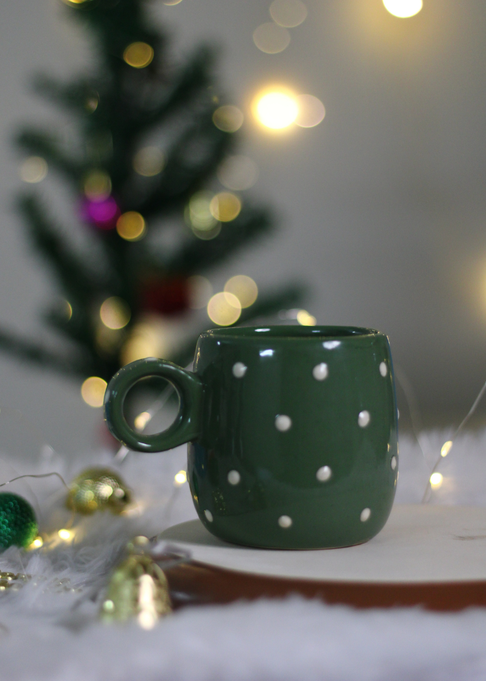 Handmade ceramic coffee mug with decorations