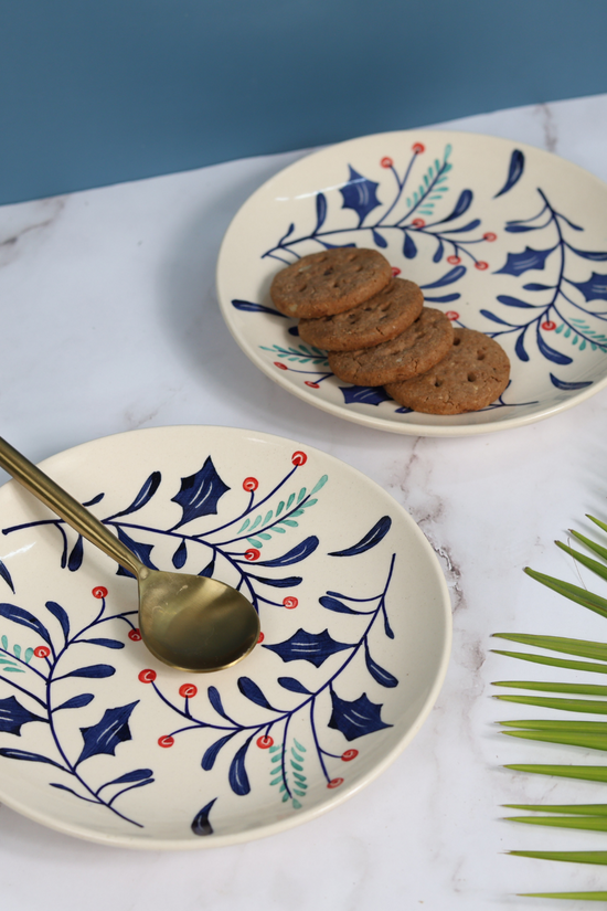 Cherries snack plates with spoon and cookies