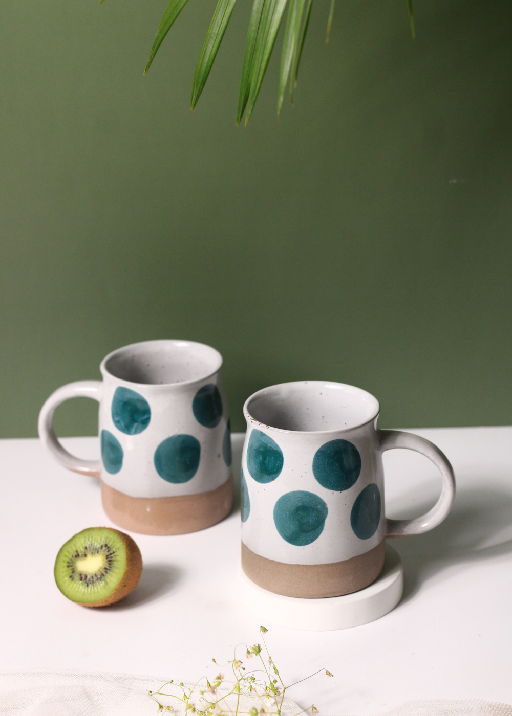 Handmade ceramic green polka mug