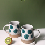 Handmade ceramic green polka mug