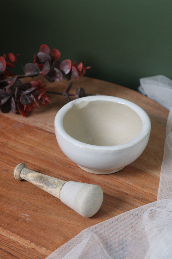 White mortar and pestle 