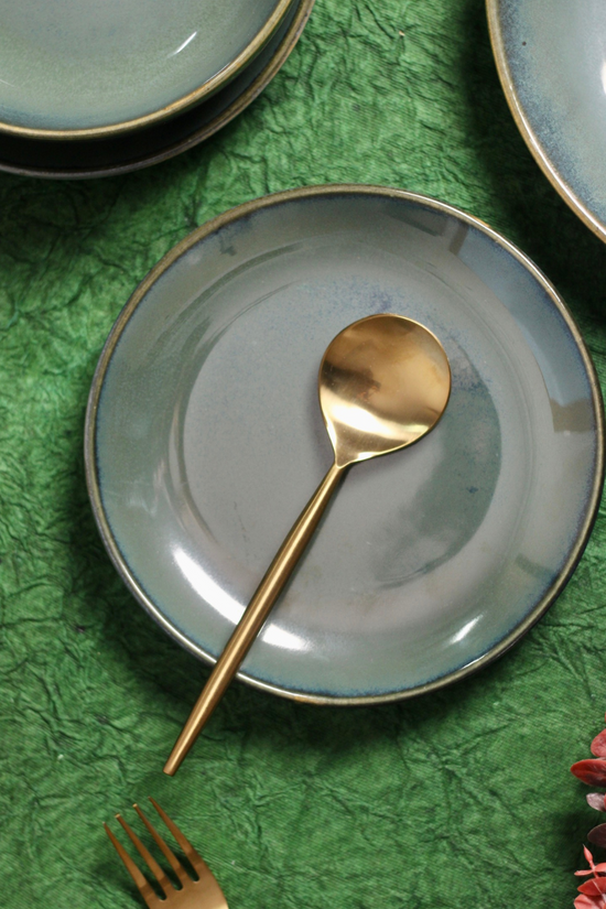 Metallic green quarter plate with spoon