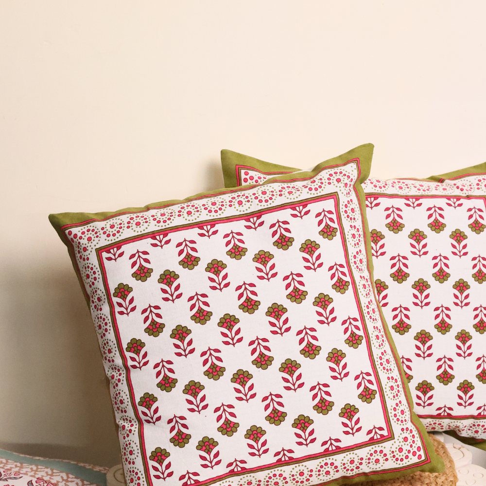 Handprinted cushions on table 