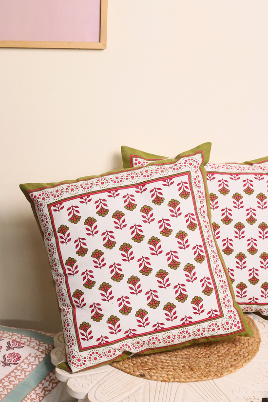 Handprinted cushions on table 