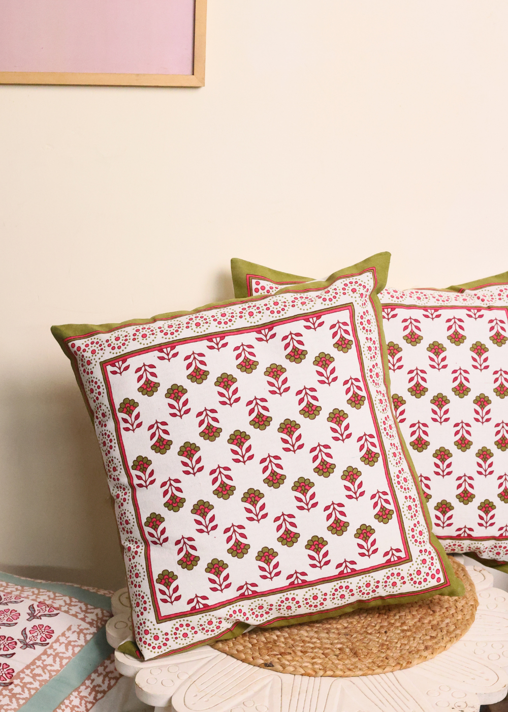 Handprinted cushions on table 