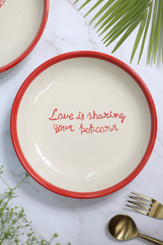 Love is sharing your popcorn pasta plate 
