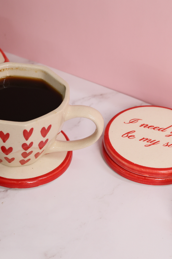Handmade ceramic coaster with coffee mug