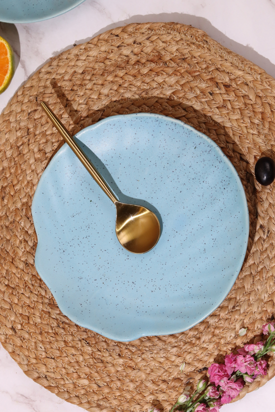 Handmade ceramic shell platter with spoon