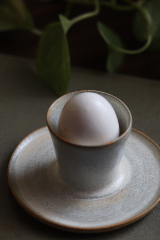Boiled egg holder with egg 