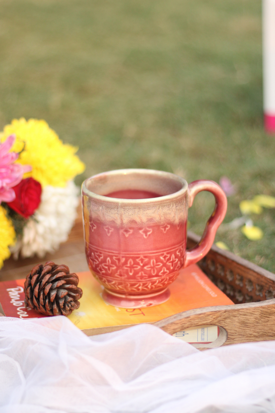 Magenta coffee mug stunning design on a wooden surface 