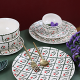Table settings with ferns dinner plates & bowls