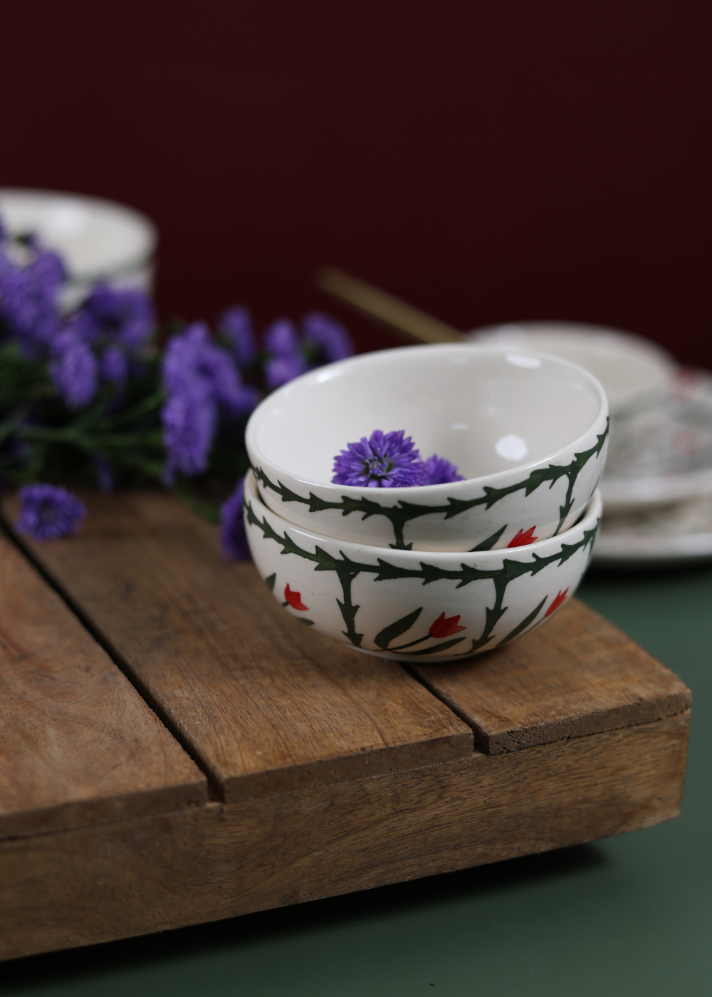 Ferns ceramic katories on wooden surface