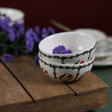 Ferns ceramic katories on wooden surface