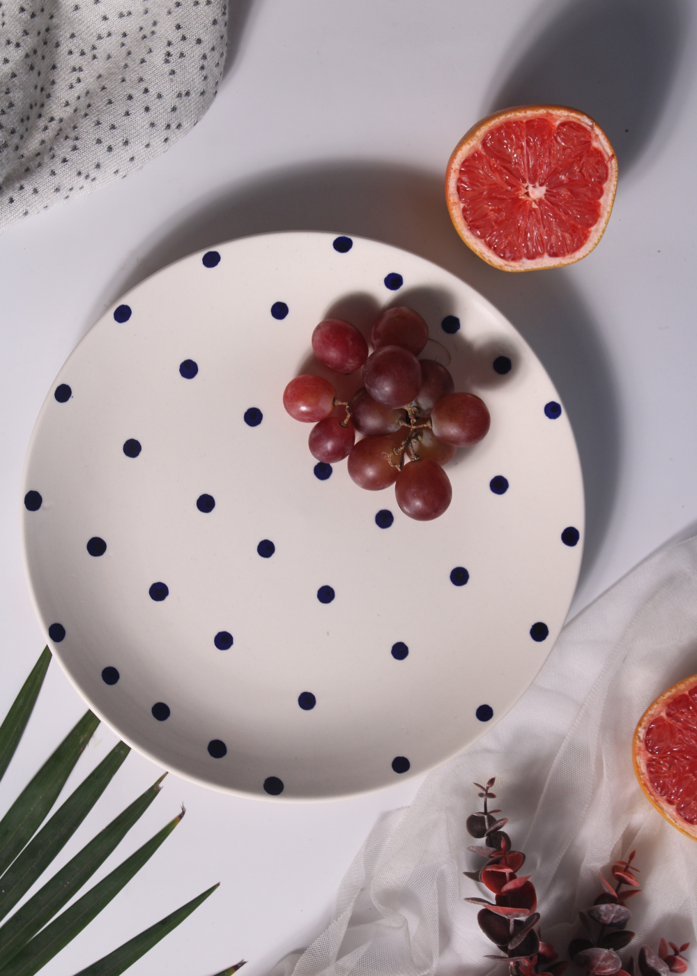 Blue polka dinner plates with fruits