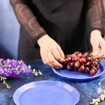 Blue snack plate with grapes