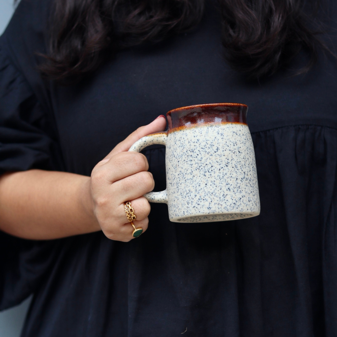 White & Brown Large Coffee Mug In Hand