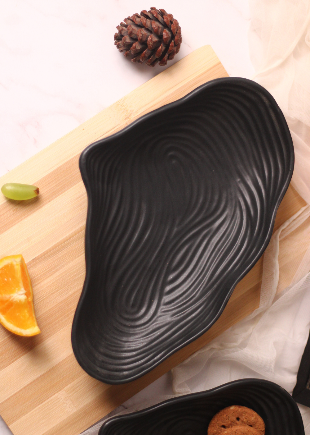 Black mistif bowl on a wooden surface