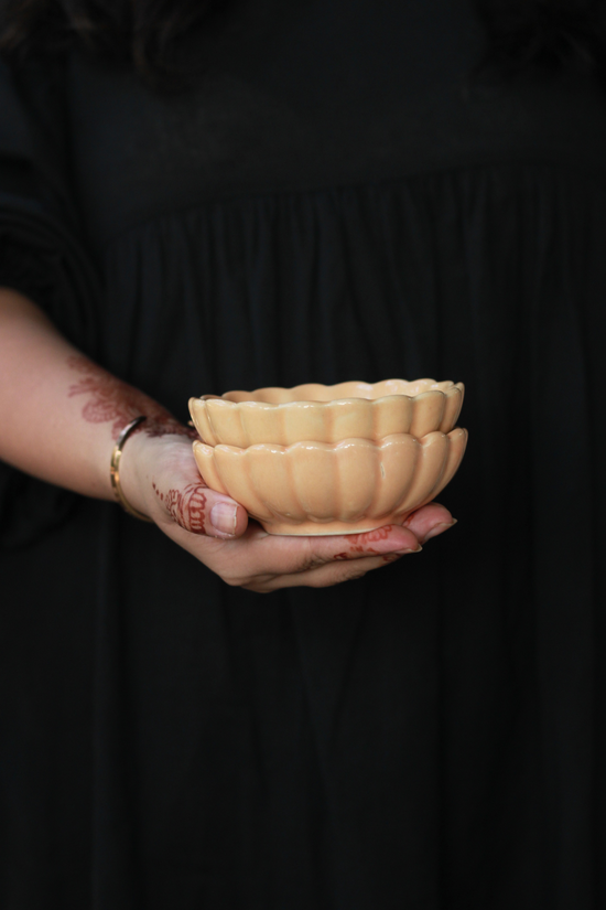 Genda phool bowls in hand