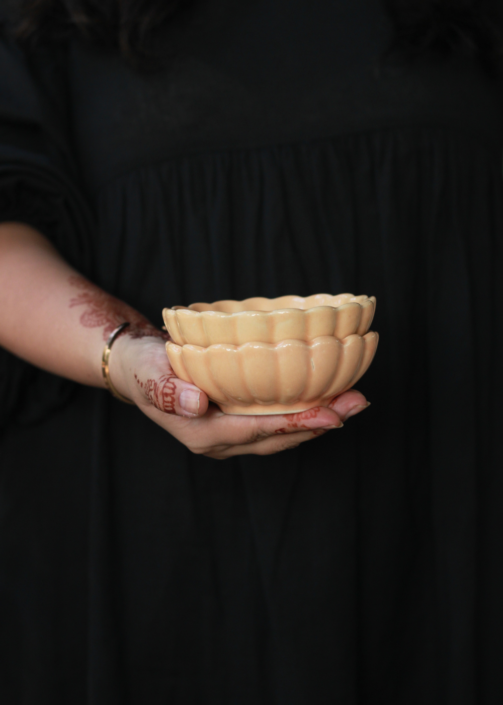 Genda phool bowls in hand