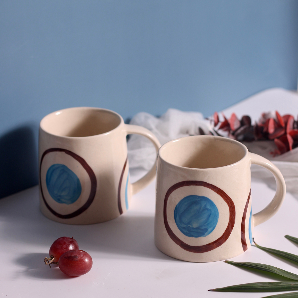 Two blue and brown ring coffee mugs 