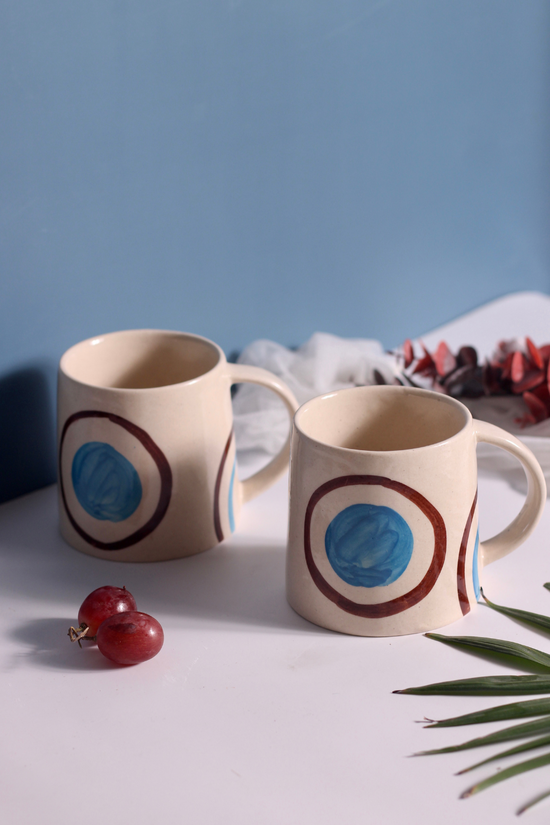Two blue and brown ring coffee mugs 