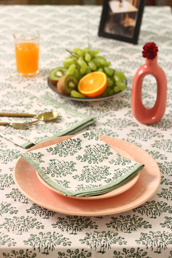 Banyan tree table napkin with dishes and fruits on it