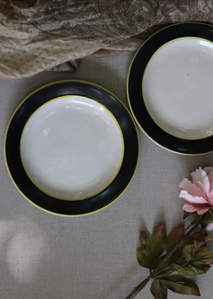 Two black and white snack plate with flower