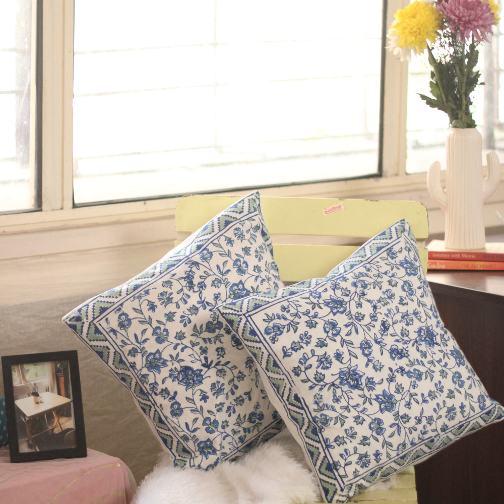 Blue floral cushion on a chair